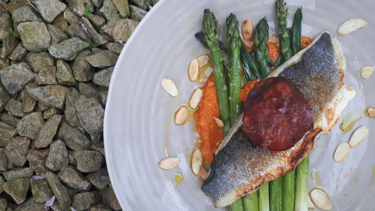 Sea Bass with Romesco Sauce with roasted fennel and asparagus The Six