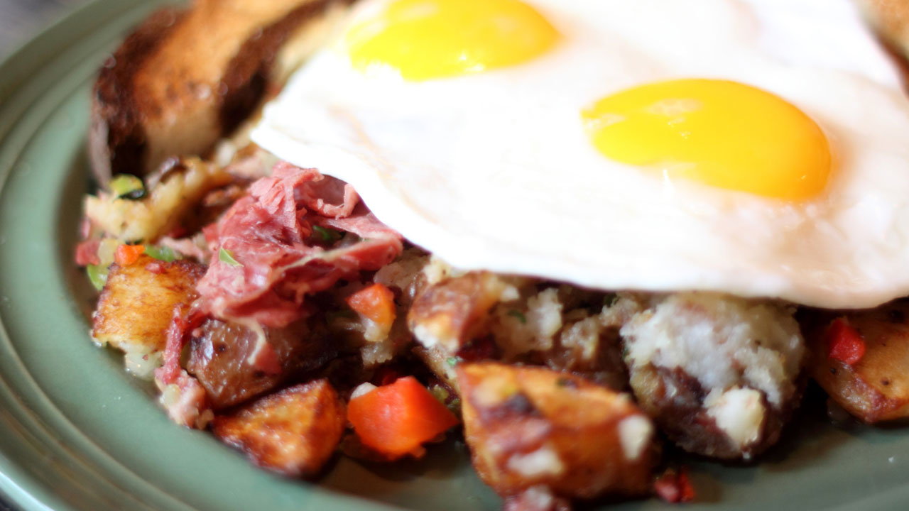Corned Beef Hash with Home Fries and Eggs Sunny Side Up