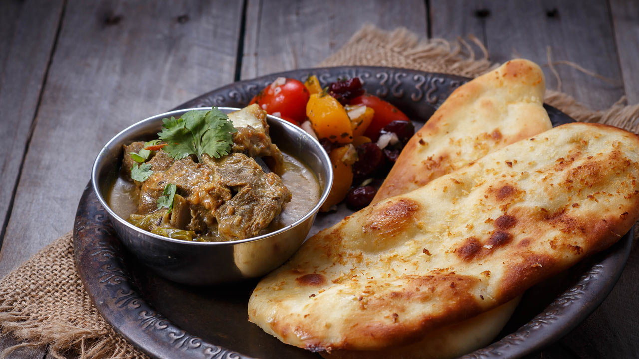 Spiced Beef Naan with Cabbage, Onion, Tomato & Horseradish Sour Cream
