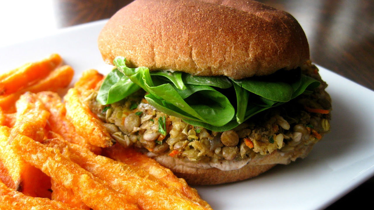 Plant-based burgers with sweet potato wedges