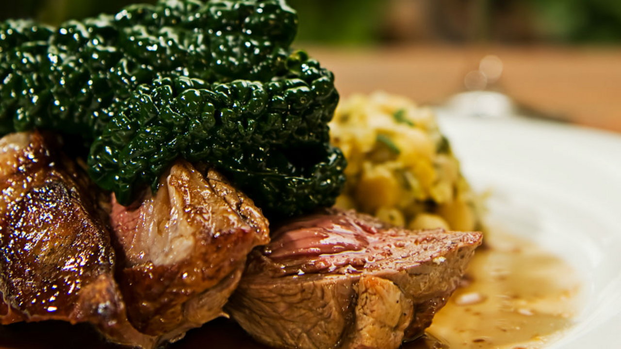 Roast rump of lamb with red pepper chutney and colcannon