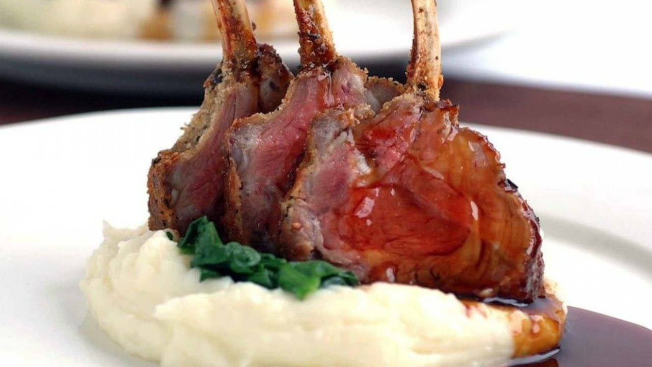 Slow cooked lamb shanks with parmesan mashed potatoes and winter greens