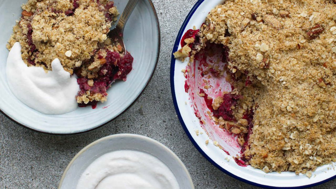 Mixed berry and apple crumble with coconut creme