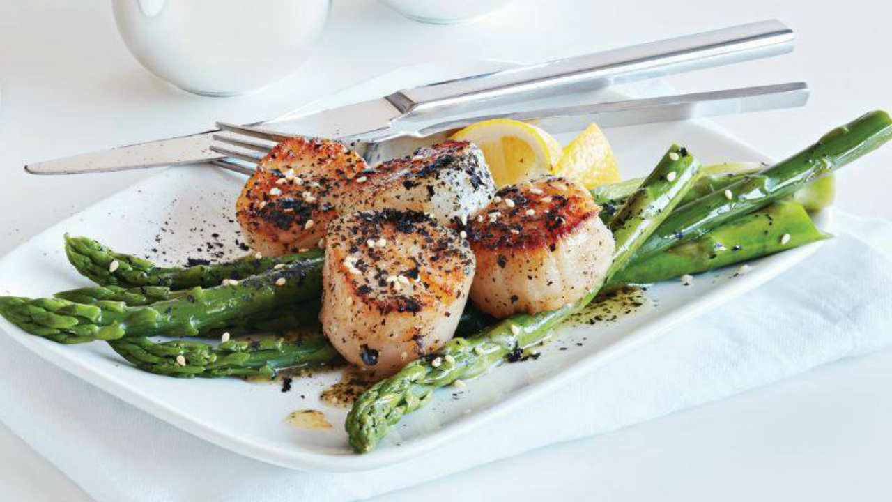 Roasted king scallops, new season asparagus and Dillisk butter The